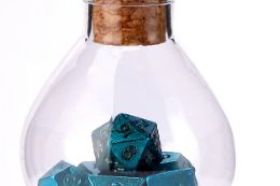 The Hymgho Unseelie Mini RPG Dice Set in Blue features a compact full polyhedral set in a rich, cool blue colorway with the distinctive Unseelie fey aesthetic. Perfect for players who love smaller dice with big personality.