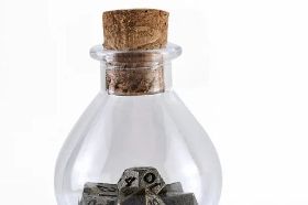 The Hymgho Unseelie Mini Metal RPG Dice Set in Ancient Bronze features miniature solid metal dice with a warm, aged bronze patina. A compact and characterful set evoking ancient adventurers and legendary campaigns.